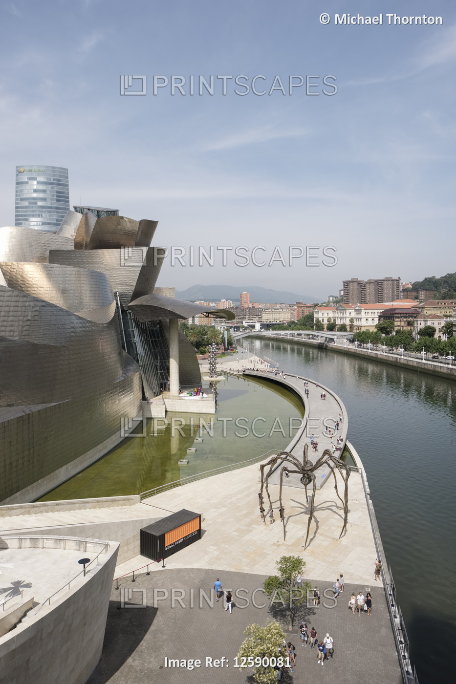 Guggenheim Musuem with Iberdrola Tower in background, Maman the giant spider in ...