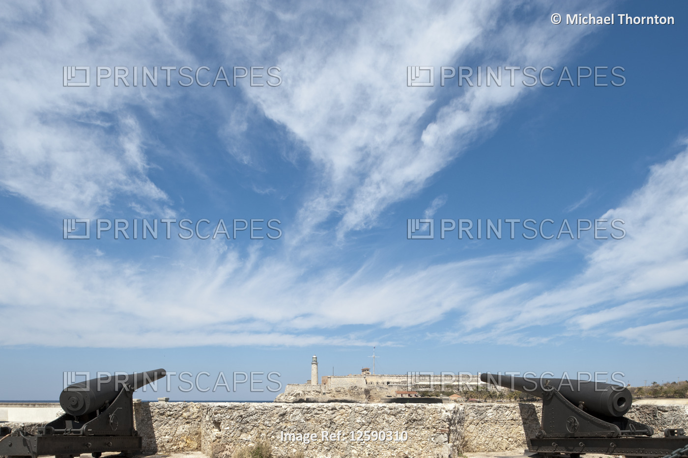 Looking from the Malecón to the Castillo de los tres reyes magos del Morro, La ...