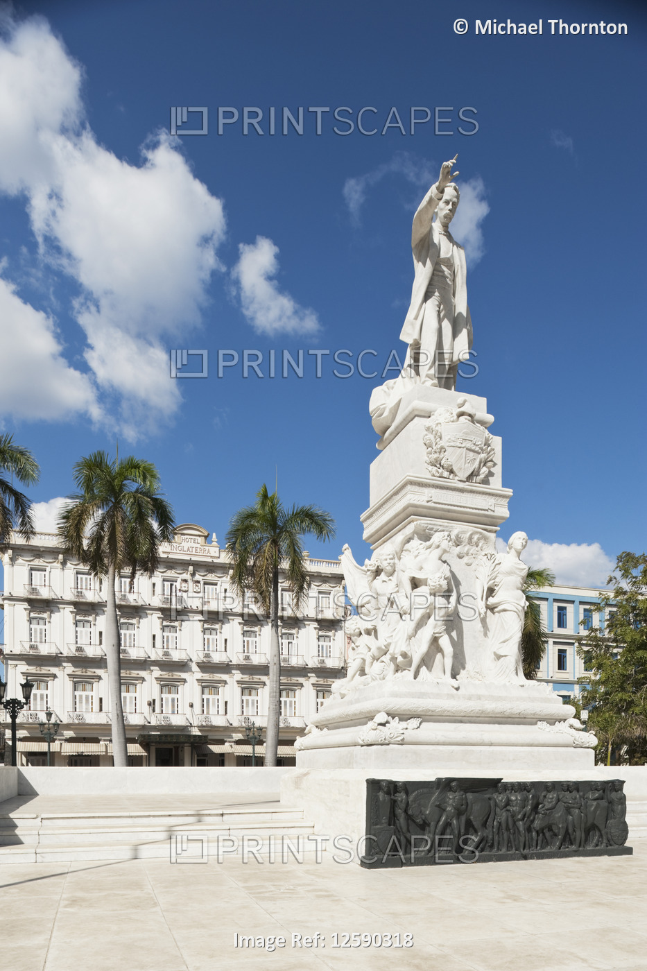 Statue of Jose Martí (Padre de la Patría) with the Hotel Inglaterra in the ...