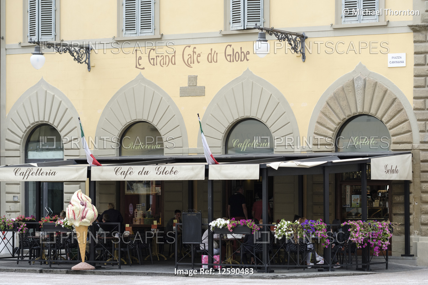 Cafe with man sized ice cream cone outside in the Piazza Cavinana, Pistoia, ...