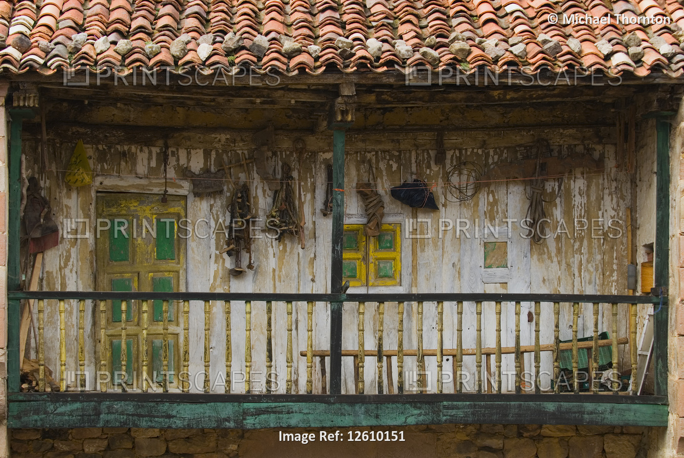 Derelict upper wooden balcony in the village of Carmona, Cantabria, Northern ...