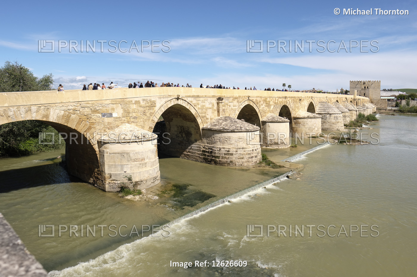 1st century Roman Bridge across Guadalquivir river, Calahorra tower in ...