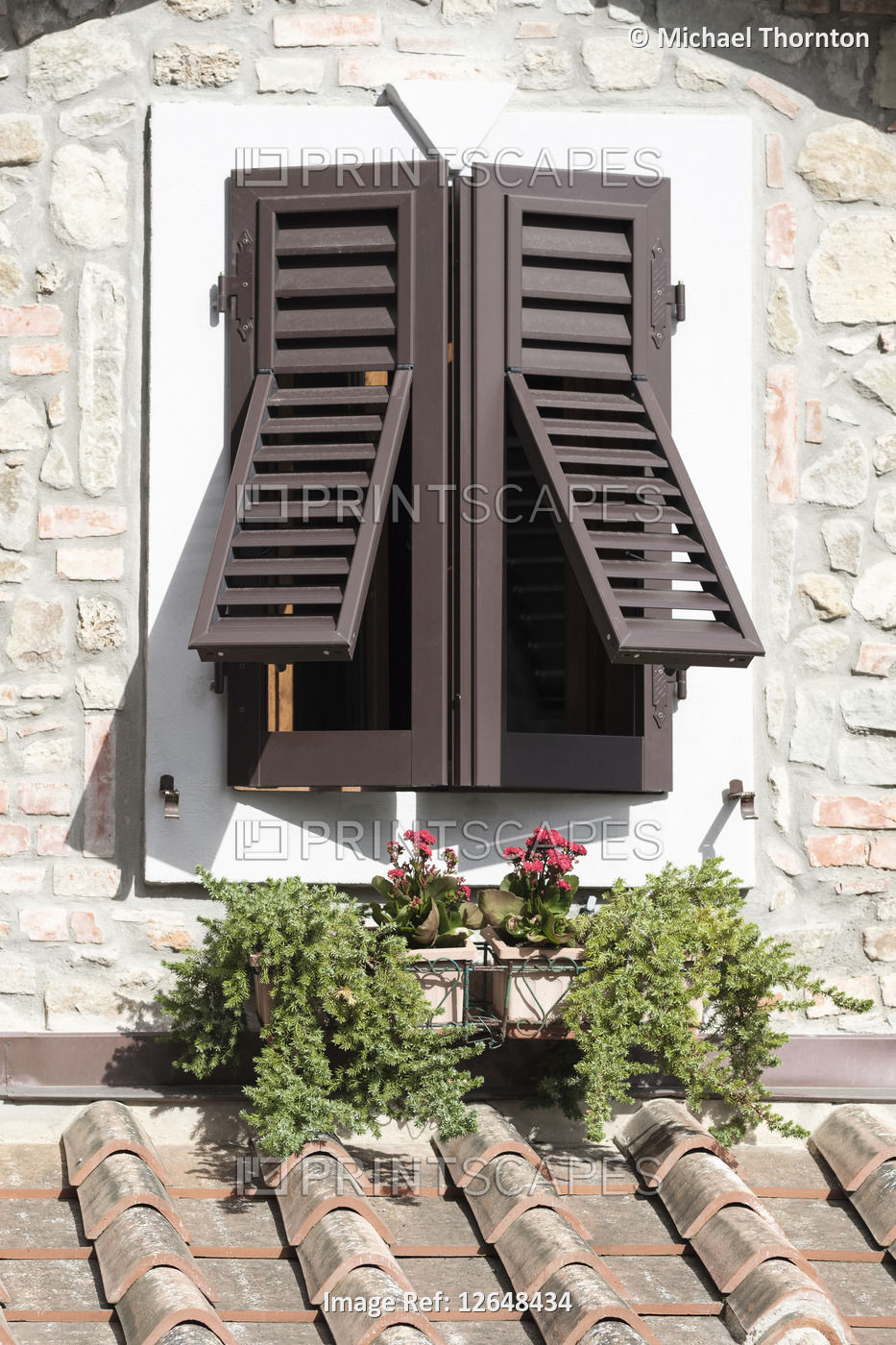 Unusual opening wooden window shutters in Montecatini Alto,  Pistoia, Tuscany, ...