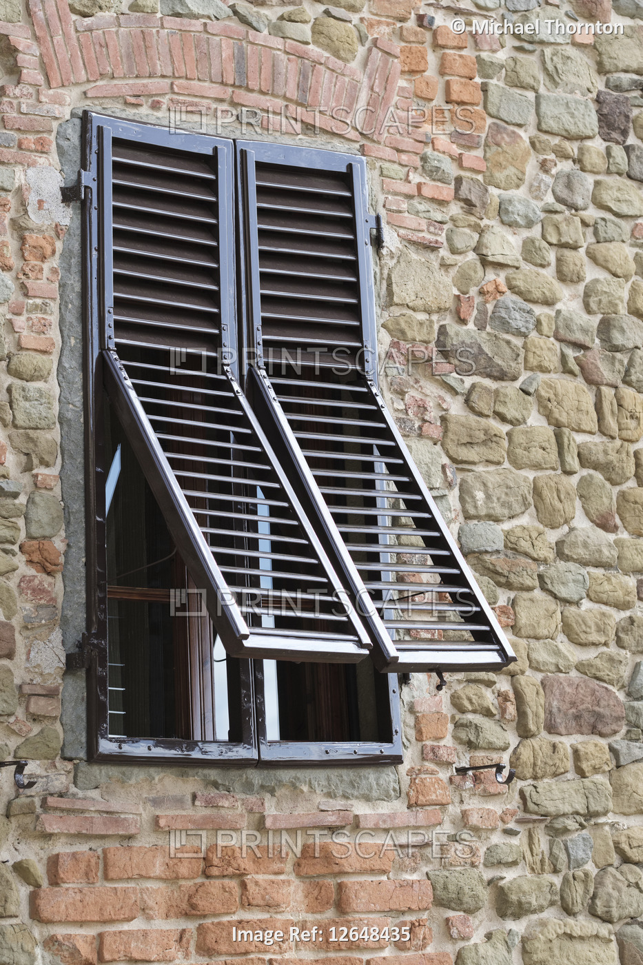 Unusual opening wooden window shutters in Montecatini Alto,  Pistoia, Tuscany, ...