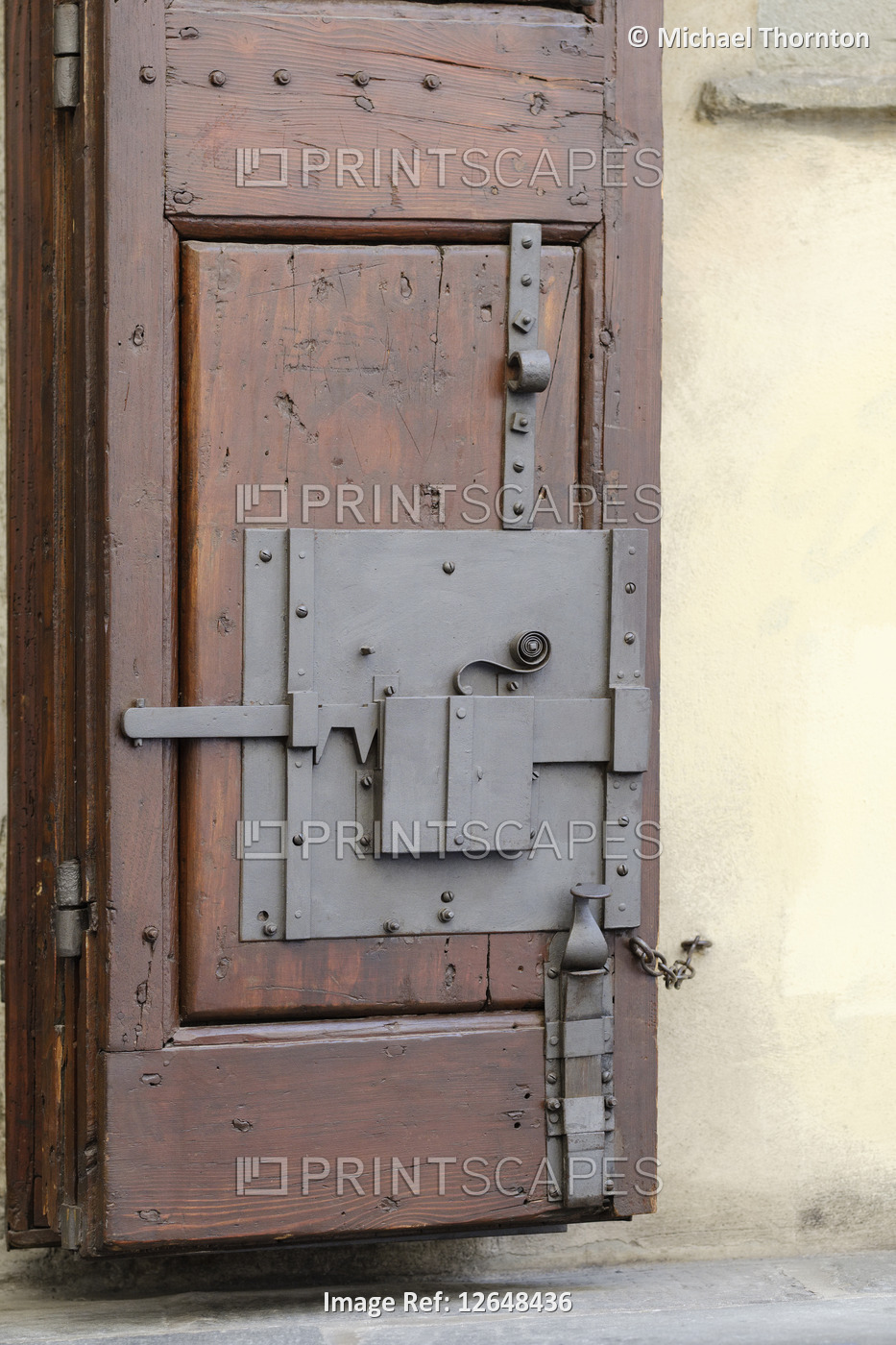 Old fashioned locking system on window shutters, old town of Pistoia, Tuscany, ...