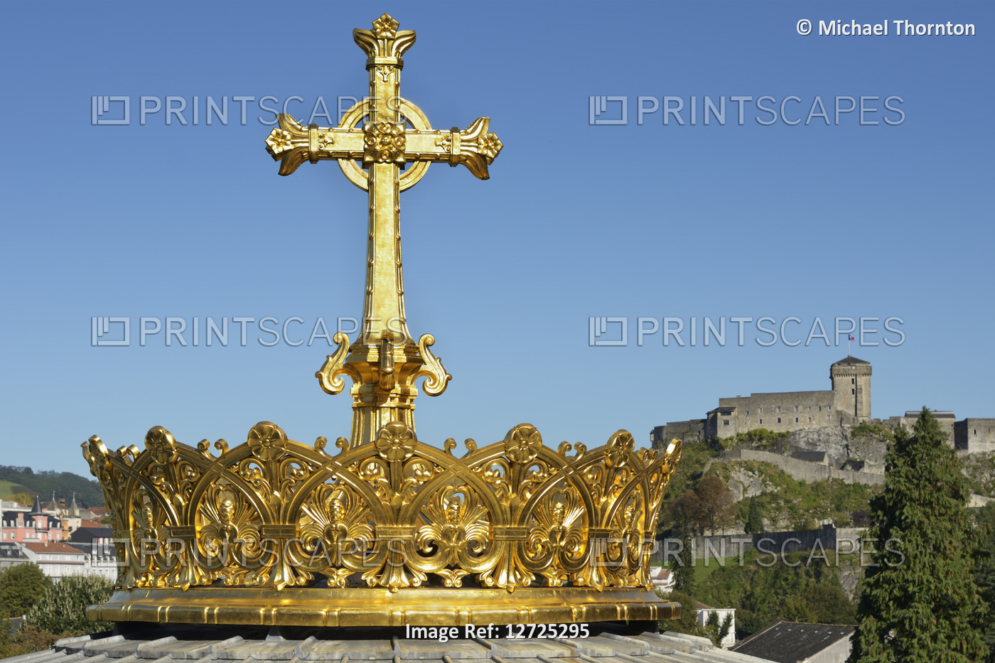 Gold Crown with Cross on top of the Cathedral Dome with Castle in background, ...
