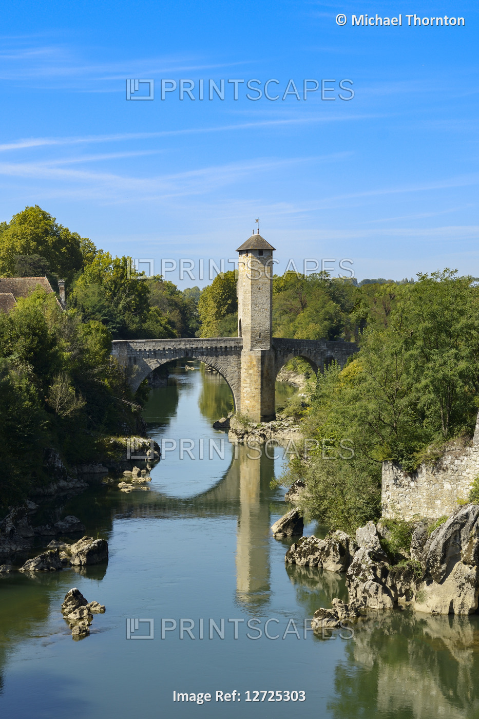 13th century bridge, Pont Vieux which spans the Gave de Pau, Orthez, ...