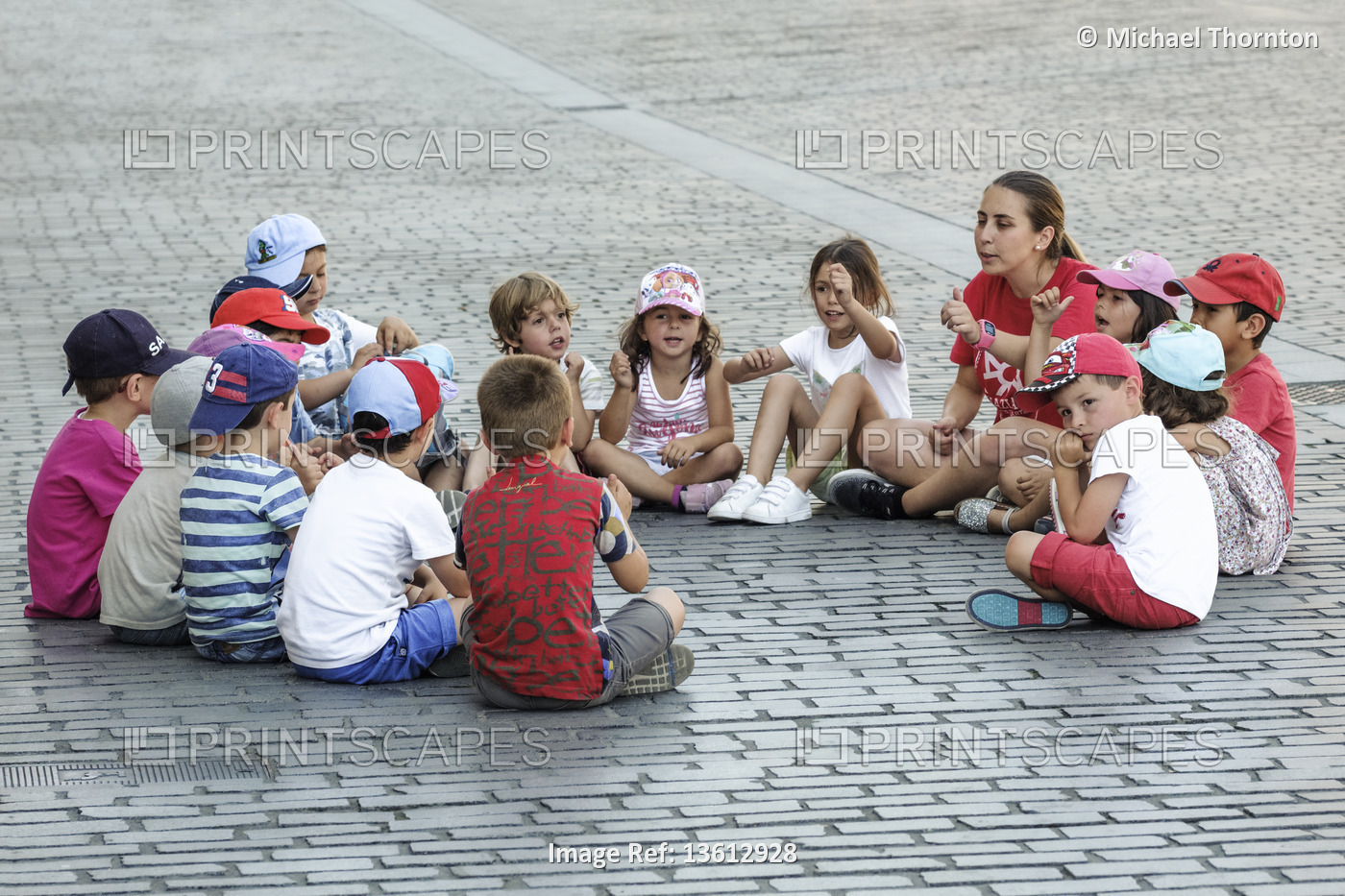 Spanish children with teacher in the Plaza de Arriaga, Bilbao, Vizcaya, Pais ...