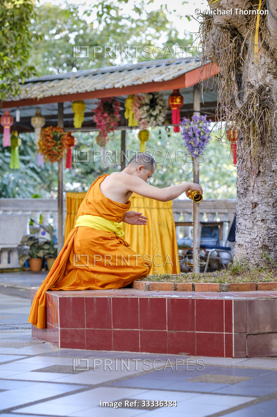 Monk spreading the merit by watering the gravel, Wat Phra That Doi Suthep, ...